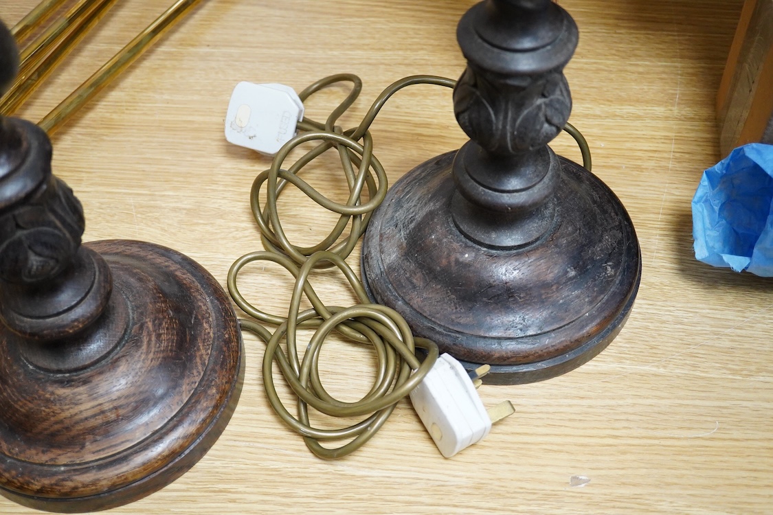 A pair of carved oak barley twist table lamps, 42cm